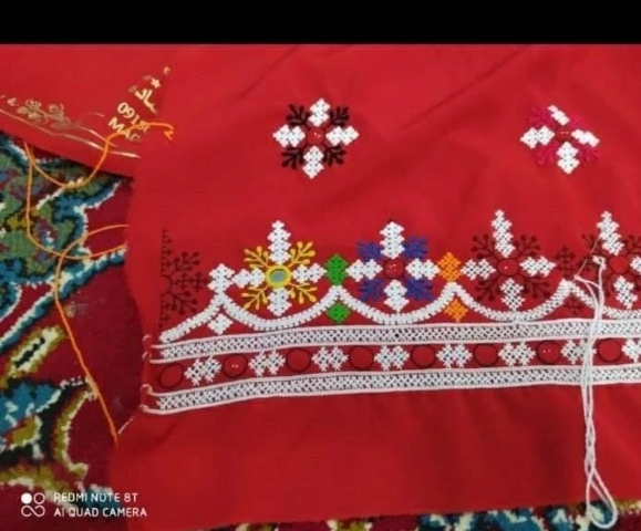 لباس دست دوچبچگانه